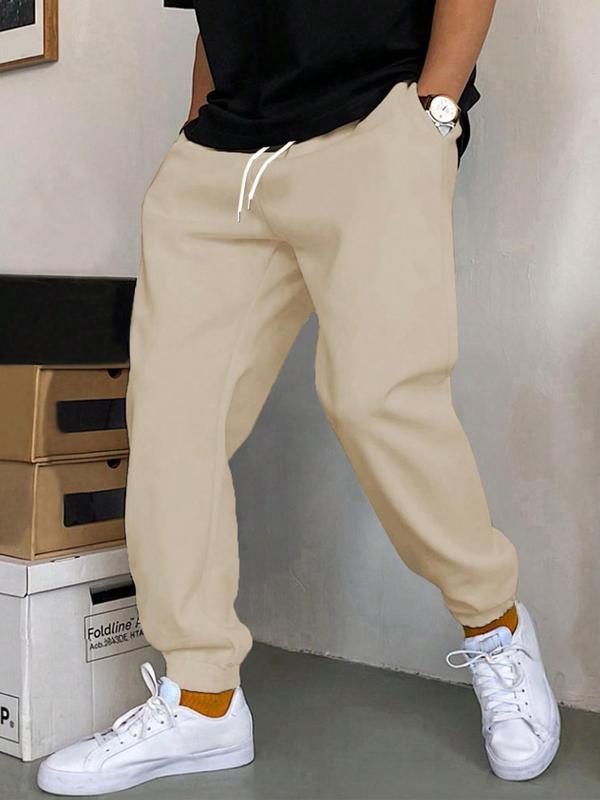 Men's Solid Drawstring Waist Sweatpants, Casual Comfy Pocket Jogger Pants for Fall & Winter, Men's Trousers for Daily Wear